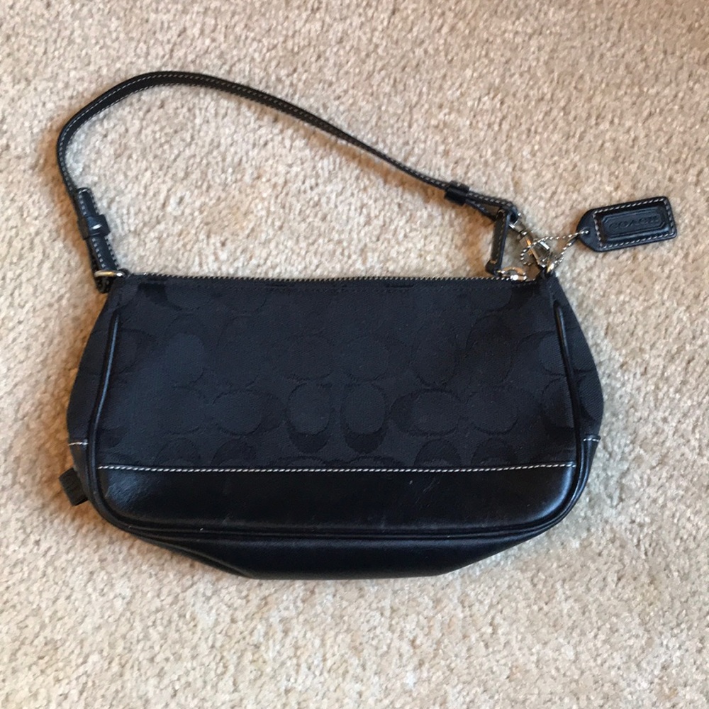 Coach black clutch.